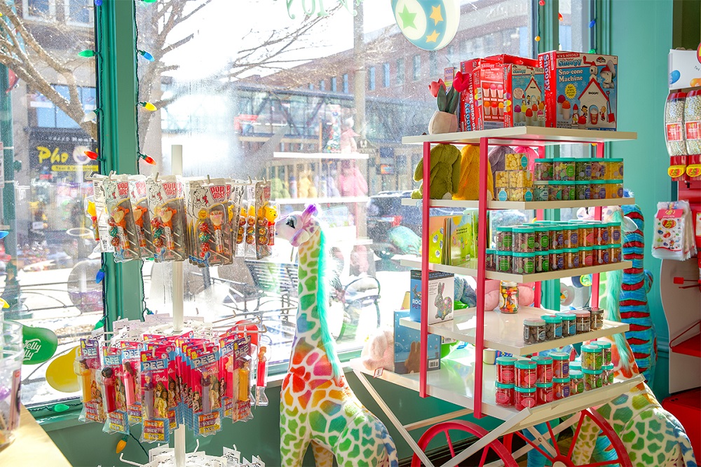 The window of a Sioux Falls toy store looking out to Phillips Avenue in downtown.
