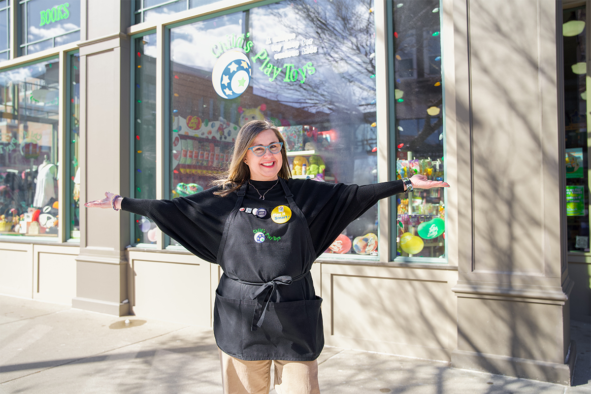 Nancy Savage, owner of Child's Play Toys, posing in front of the Sioux Falls toy store.