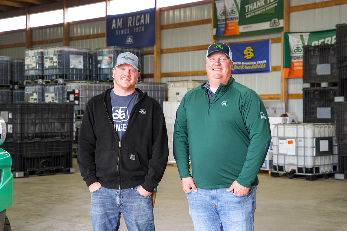 Rob Thuringer and Dave Ellens standing in their business's warehouse.