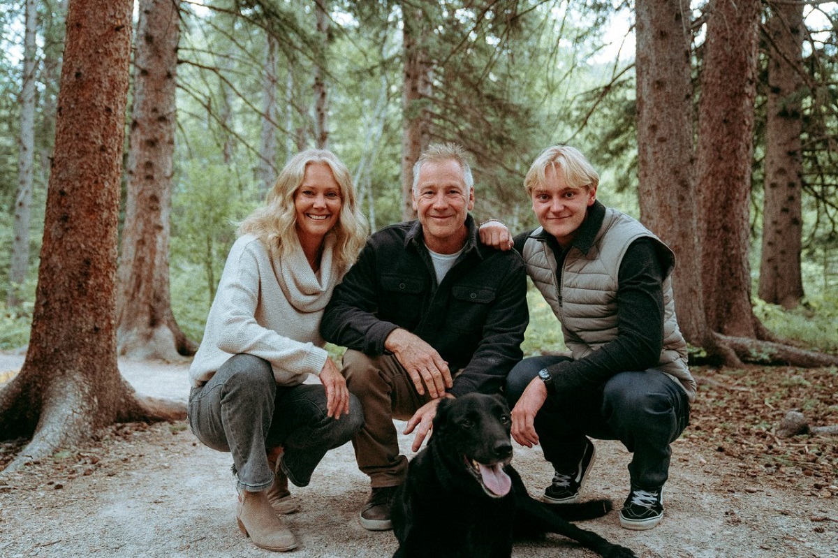 A family picture of Terri Foster with her husband and son.