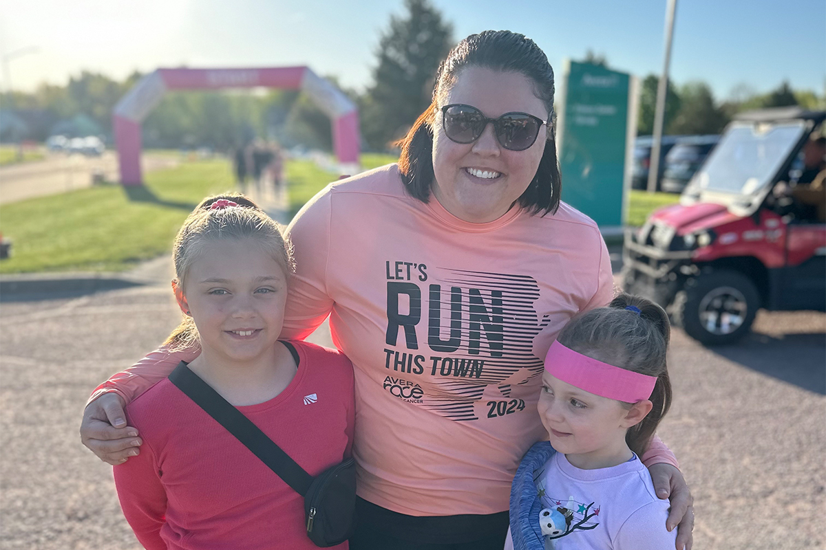 A woman and her young daughters at the Avera Race Against Cancer.