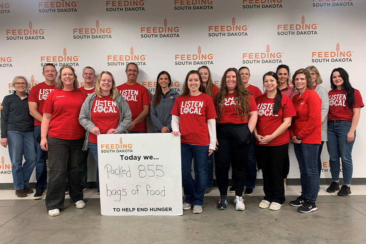 A group of First National Bank teammates volunteering at Feeding South Dakota.