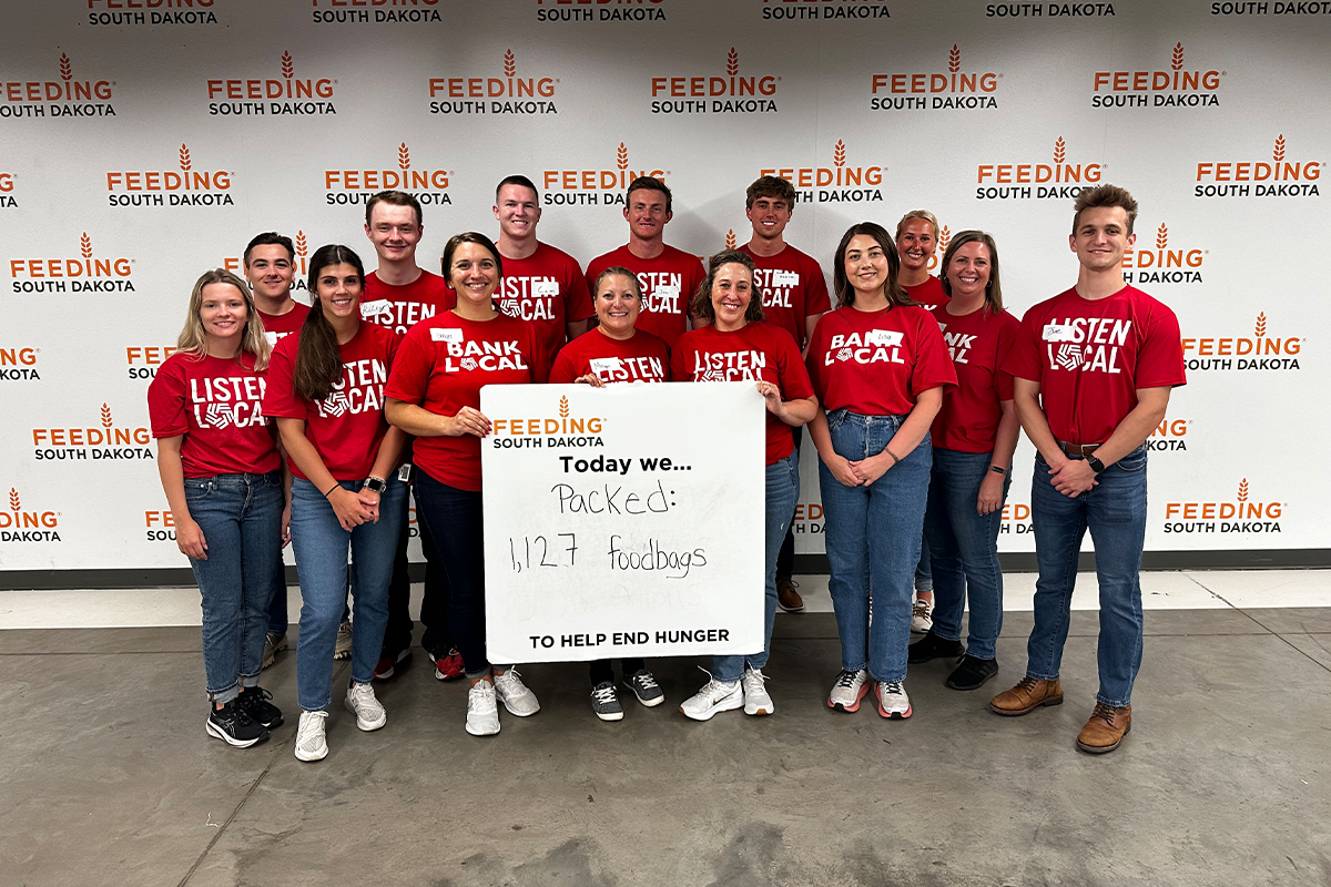 A group of First National Bank teammates volunteering at Feeding South Dakota.