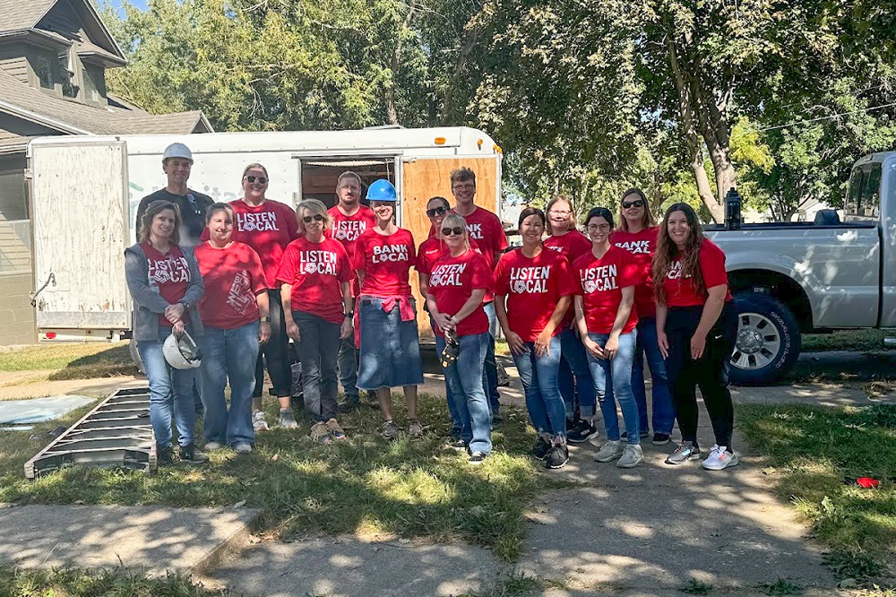 A group of First National Bank teammates volunteering at Habitat for Humanity.