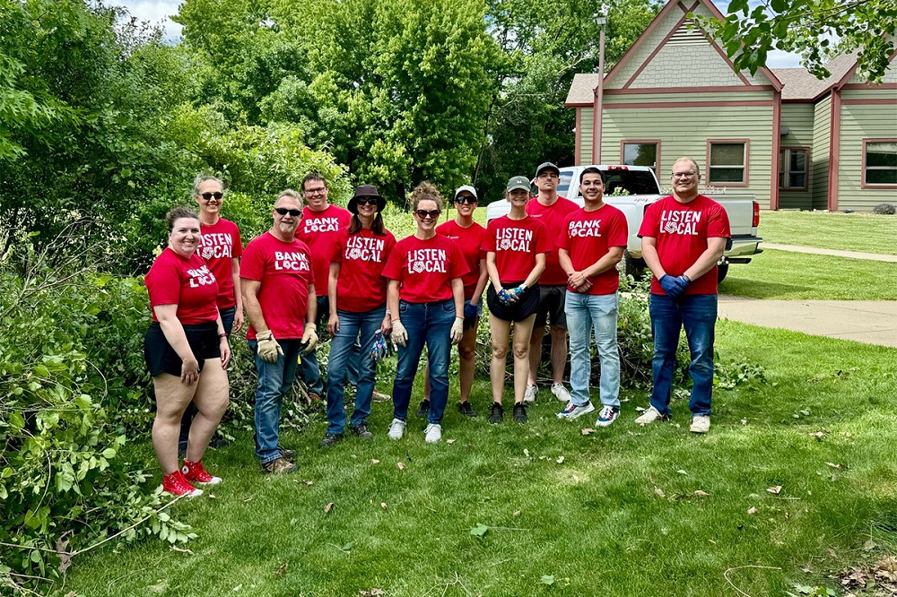 A group of First National Bank teammates volunteering at The Outdoor Campus in Sioux Falls.