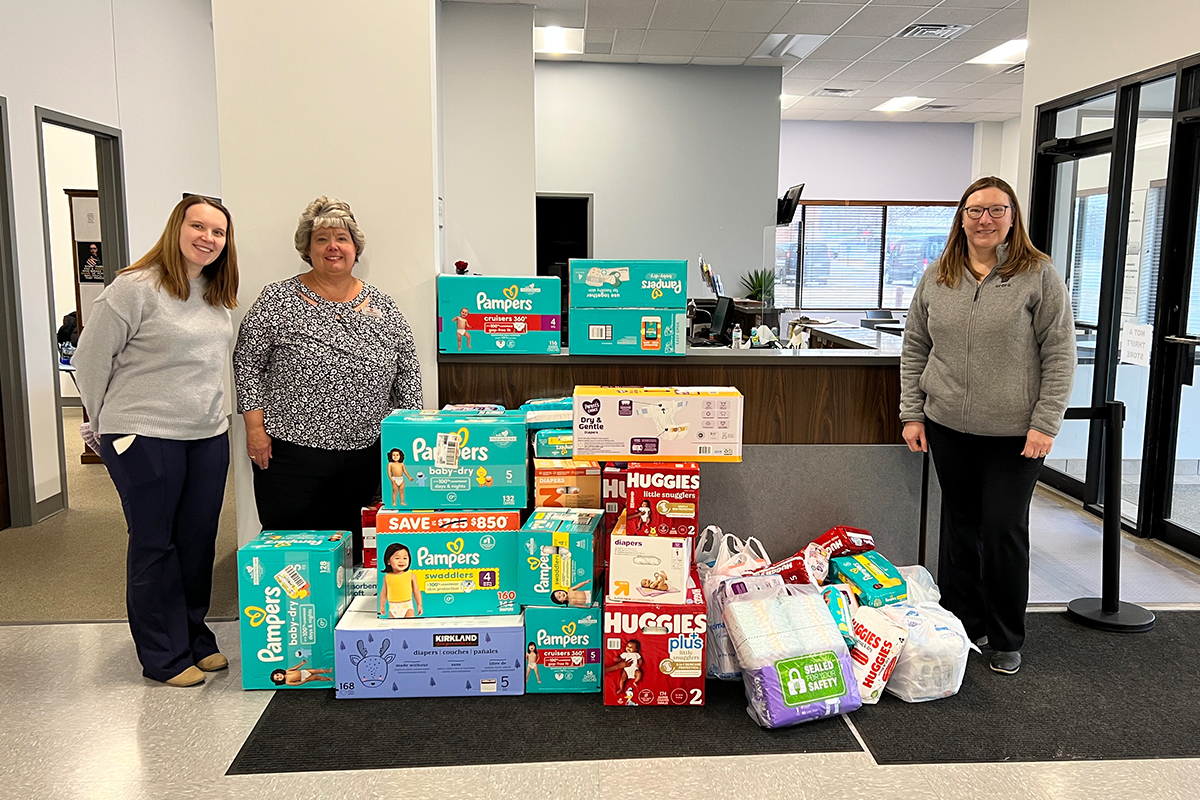 Three First National Bank teammates delivering diapers to The Salvation Army of Sioux Falls.